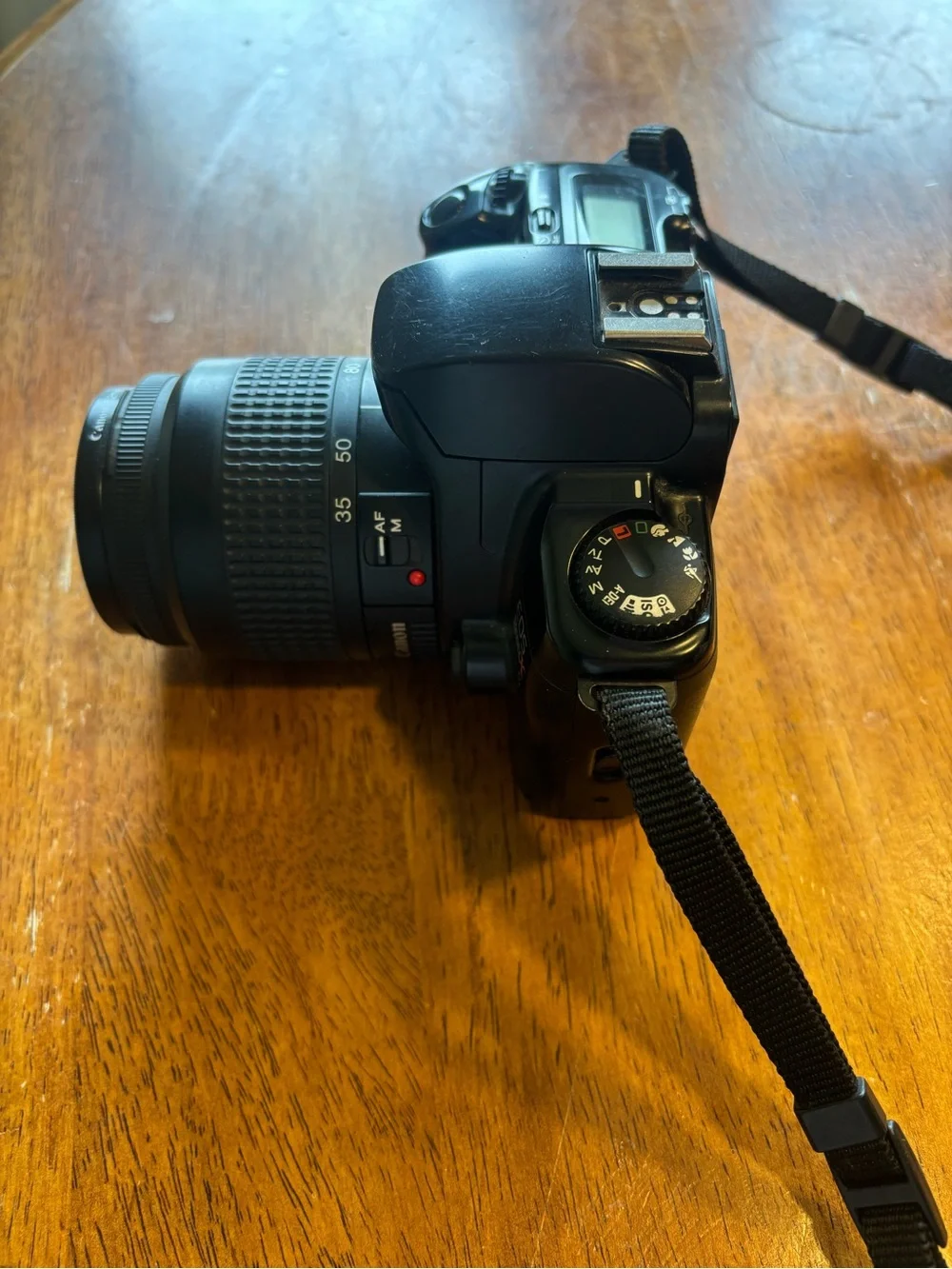 Canon Rebel X Black DSLR Camera with Navy and Red Strap